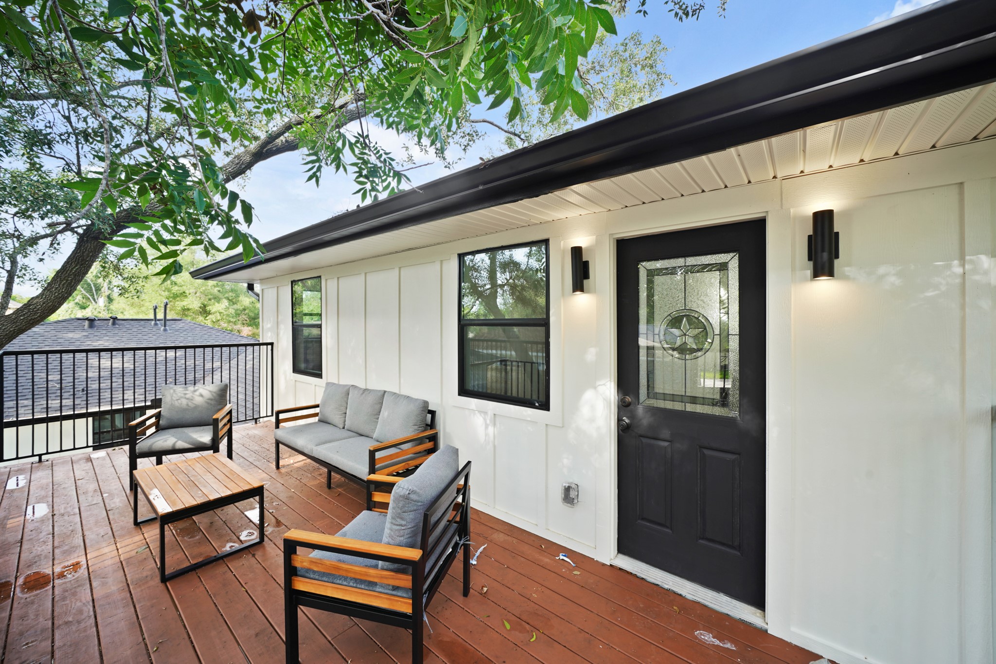 4813 Hummingbird Street Houston, TX 77035 - Photo 32 of 50 Everyone will Enjoy this Wonderfully Expansive (Approximately 14'8" x 7') Wood Stained Upper Deck Wood Patio, complete with 48" Metal Rails. Whether Enjoying a Cup of Coffee or a Beverage of your Choice, this Relaxing Retreat will be the "Go To" Spot from Morning to Night Time - Have Fun!