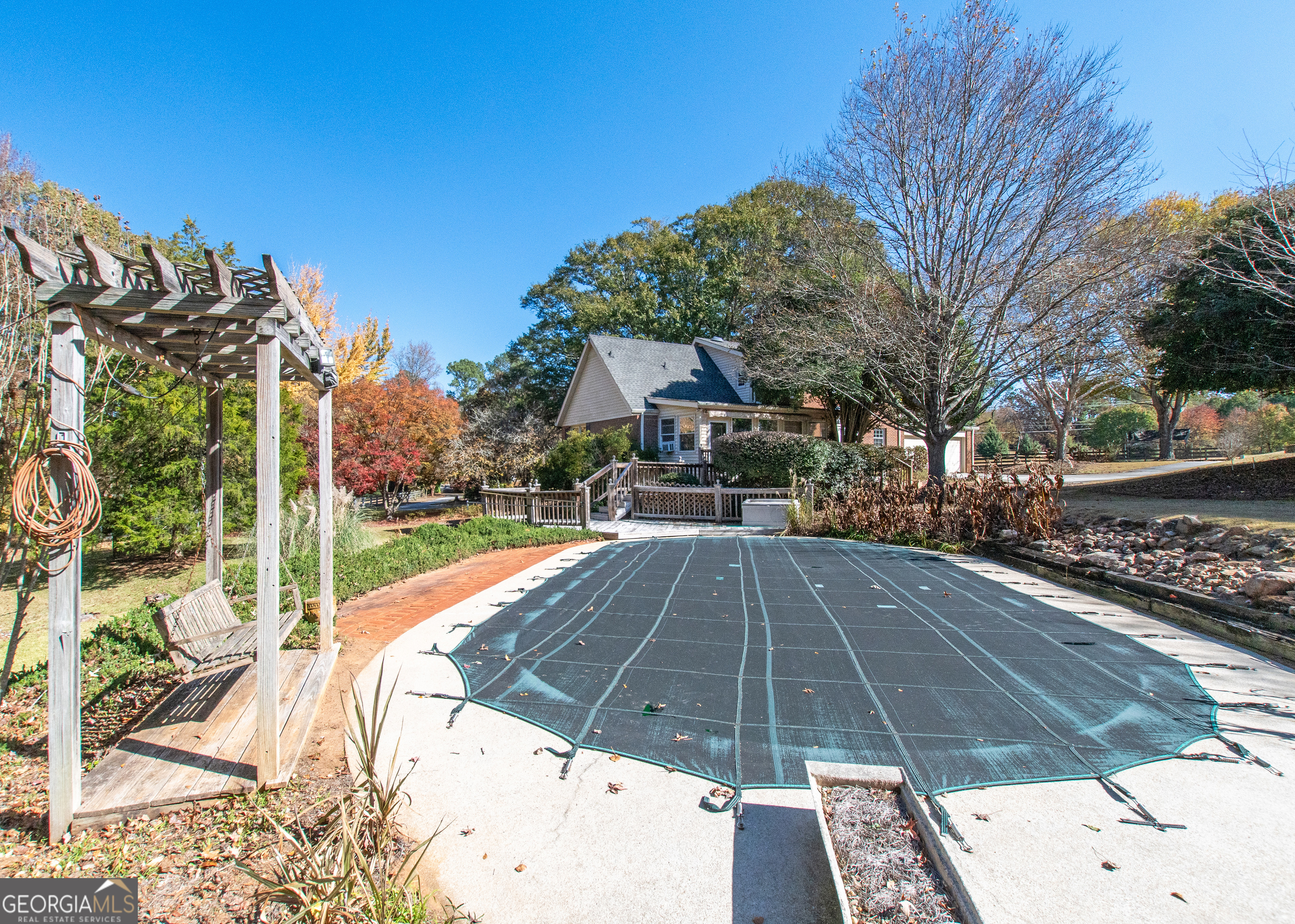 13819 Woolsey Road Hampton, GA 30228 - Photo 17 of 100 a view of a backyard with a patio