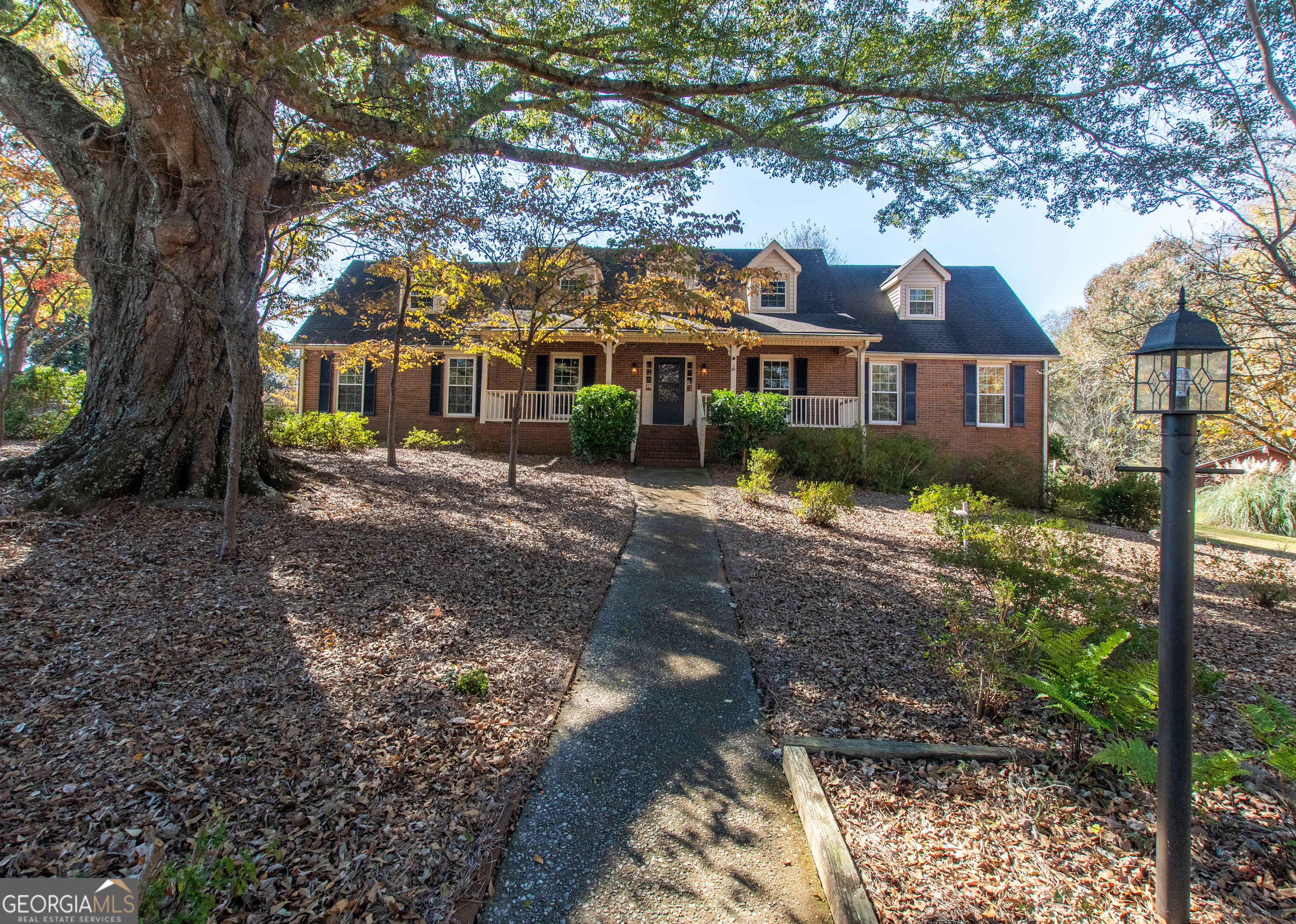 13819 Woolsey Road Hampton, GA 30228 - Photo 2 of 100 a front view of a house with a yard