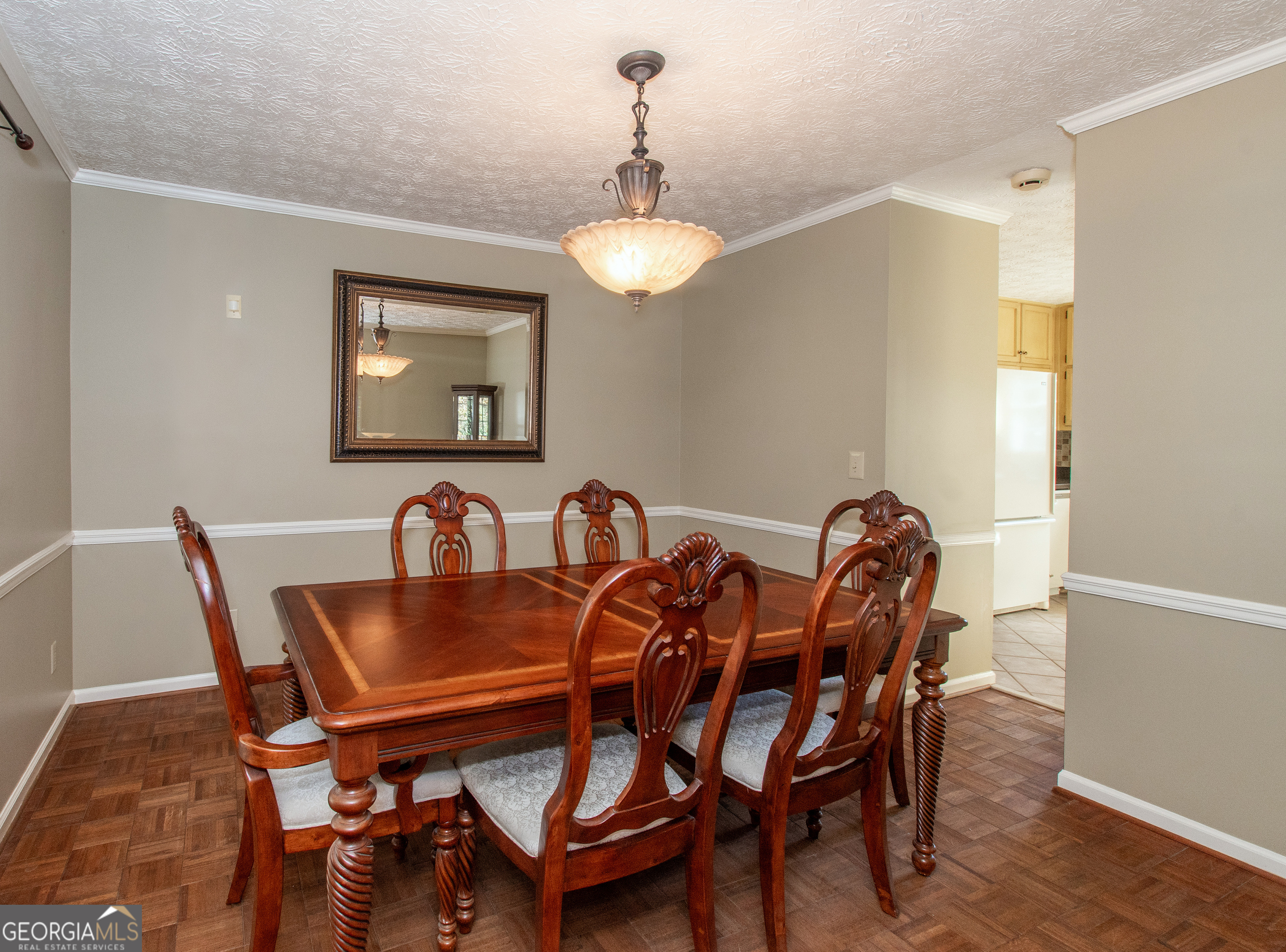 13819 Woolsey Road Hampton, GA 30228 - Photo 59 of 100 a view of a dining room with furniture and wooden floor