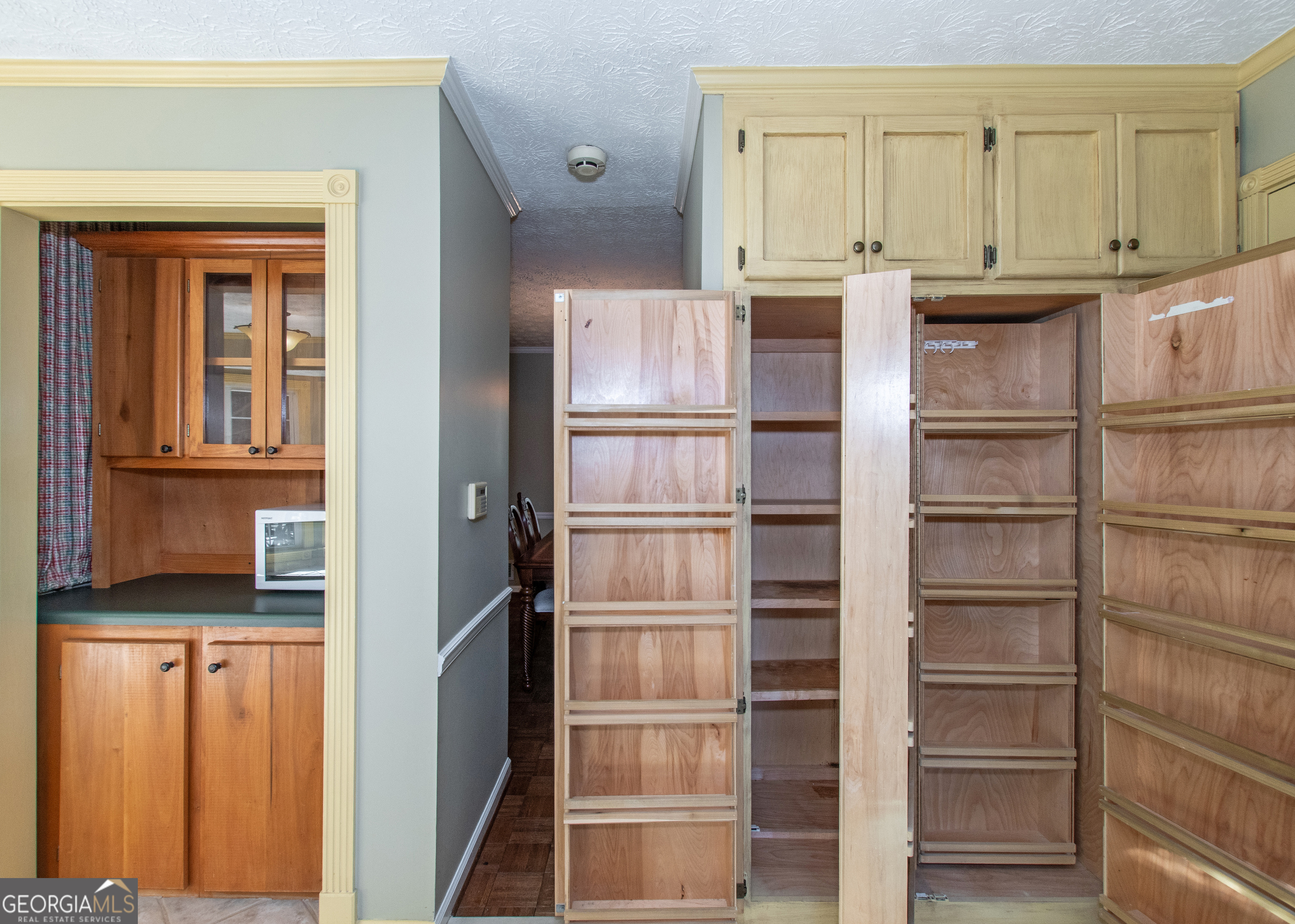 13819 Woolsey Road Hampton, GA 30228 - Photo 63 of 100 a view of kitchen with wooden cabinet