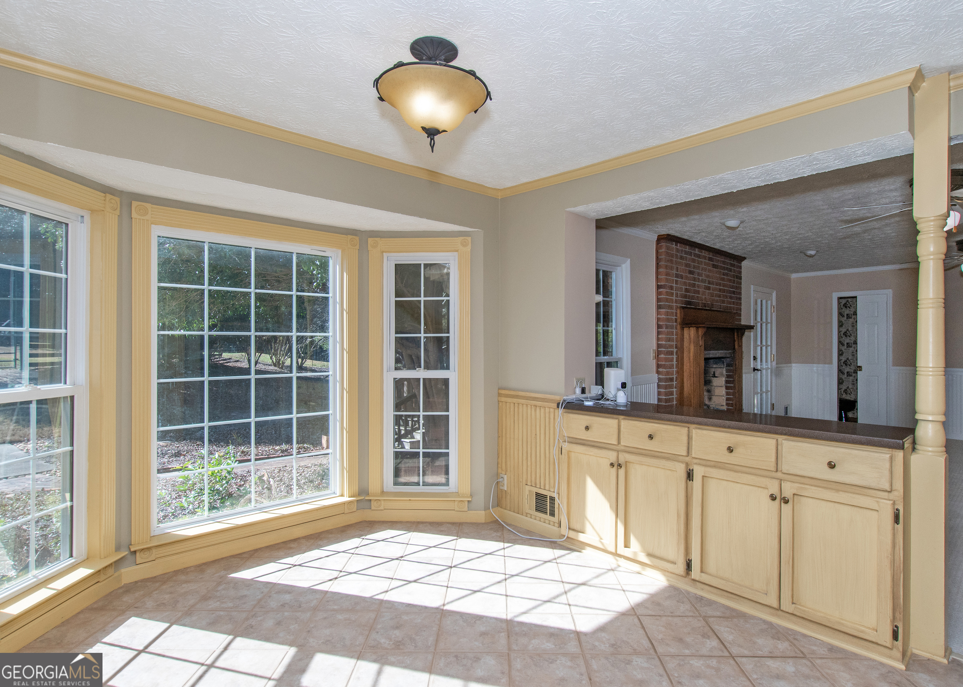 13819 Woolsey Road Hampton, GA 30228 - Photo 65 of 100 a bedroom with a large bed and a large window