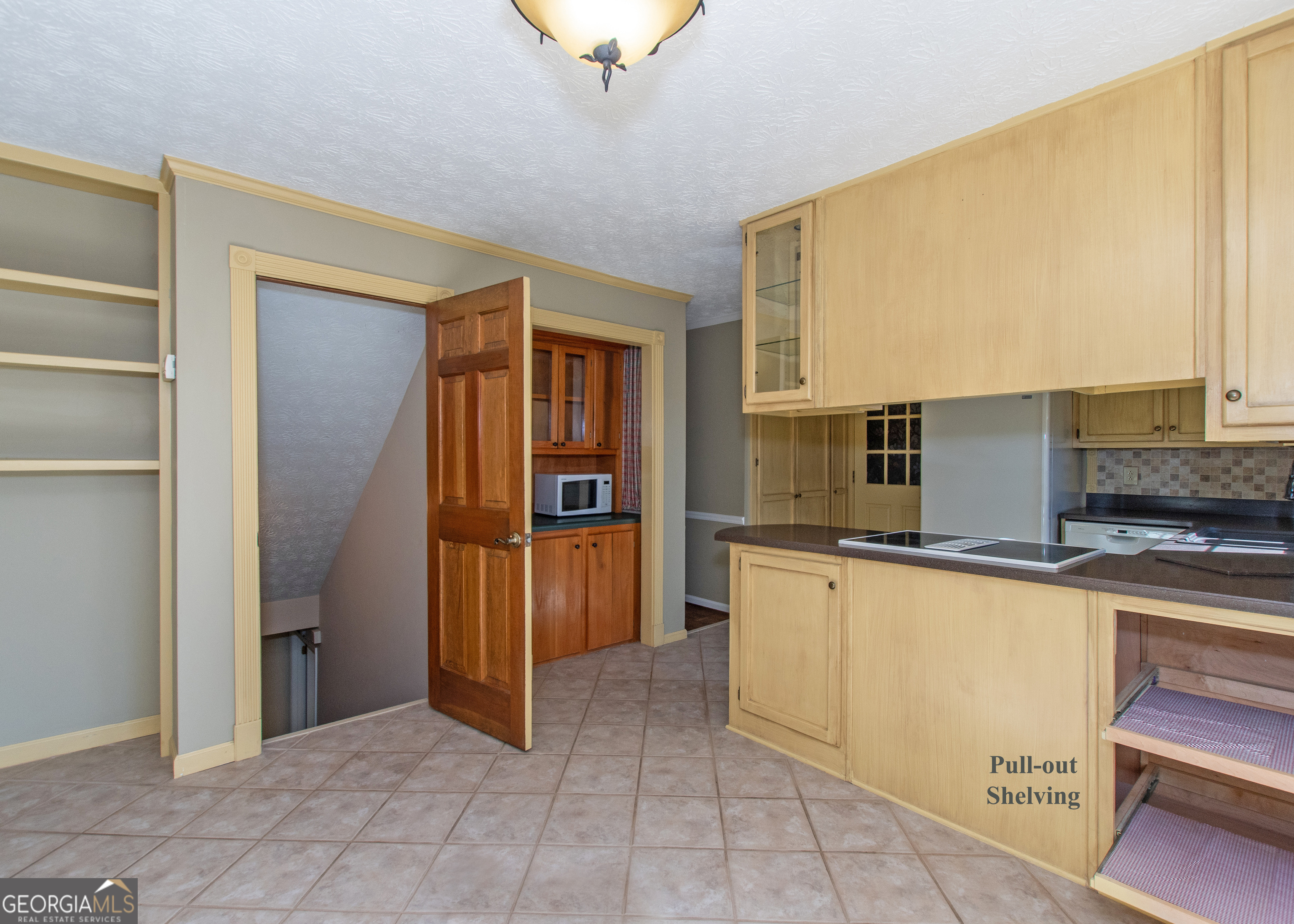 13819 Woolsey Road Hampton, GA 30228 - Photo 66 of 100 a kitchen with stainless steel appliances granite countertop a refrigerator and a stove top oven