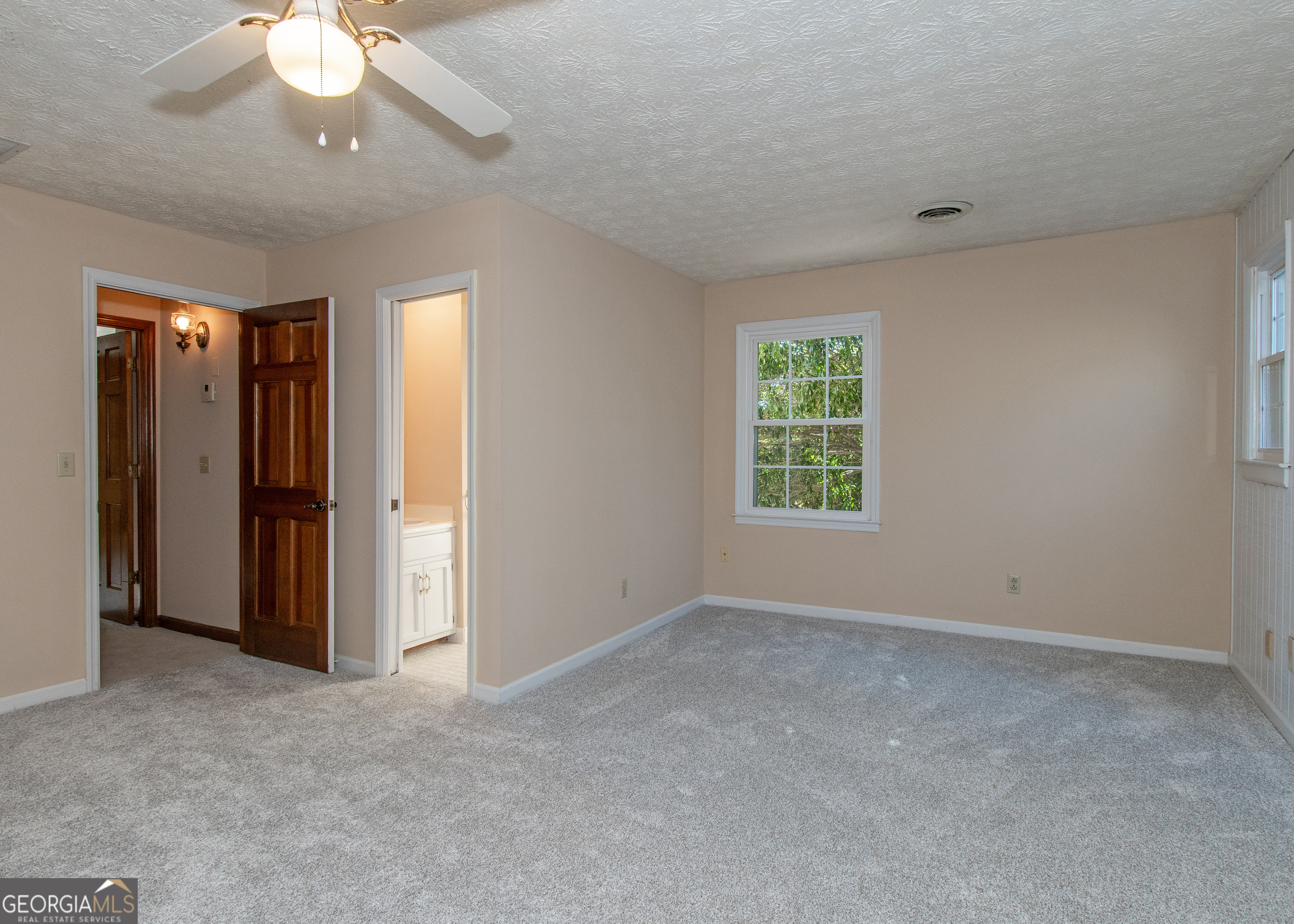 13819 Woolsey Road Hampton, GA 30228 - Photo 82 of 100 a view of an empty room with a window