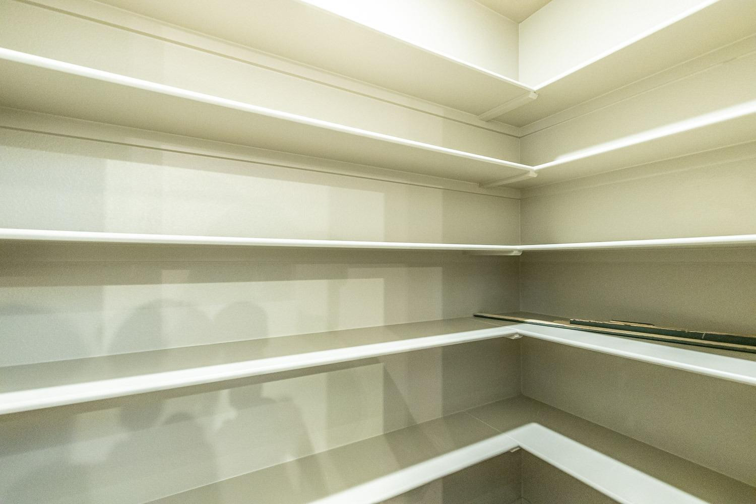 3633 133rd Street Lubbock, TX 79423 - Photo 16 of 46 a view of a room with shelf