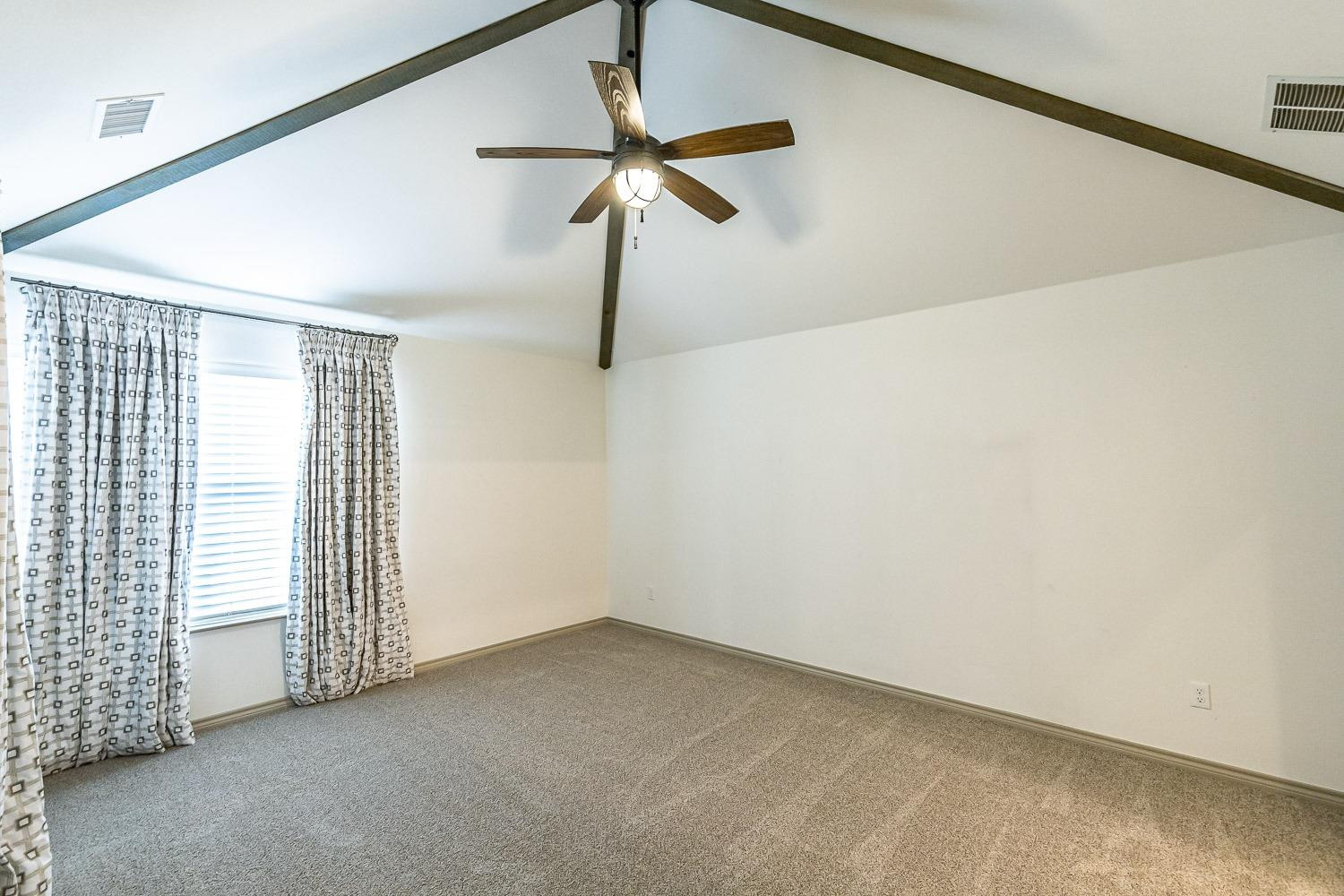 3633 133rd Street Lubbock, TX 79423 - Photo 20 of 46 a view of an empty room with a window