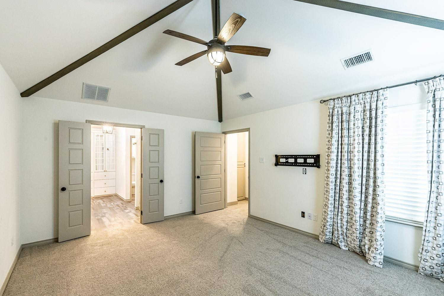 3633 133rd Street Lubbock, TX 79423 - Photo 21 of 46 a view of empty room with ceiling fan