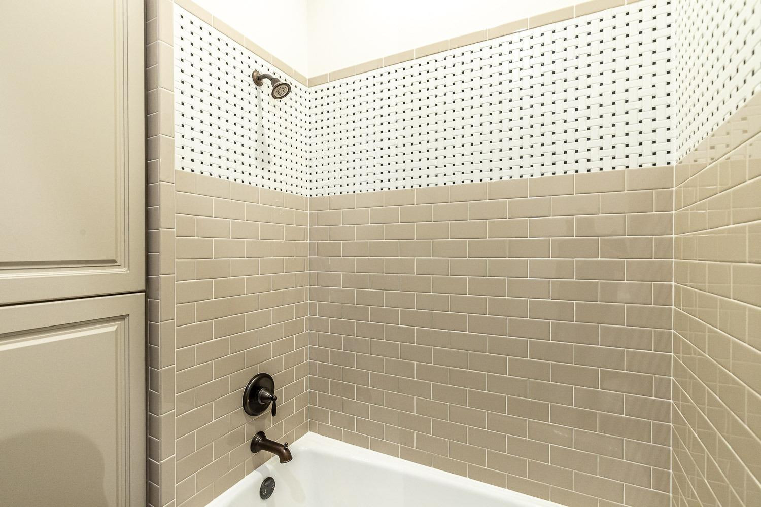 3633 133rd Street Lubbock, TX 79423 - Photo 34 of 46 a bathroom with a bathtub