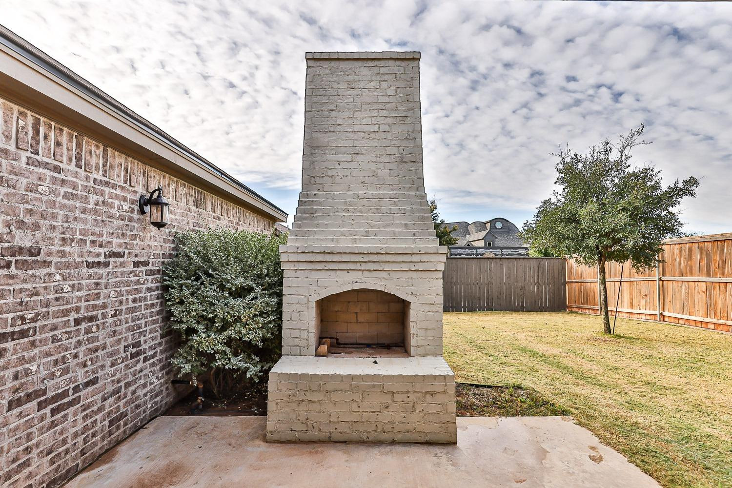 3633 133rd Street Lubbock, TX 79423 - Photo 42 of 46 a view of house with a yard and entertaining space