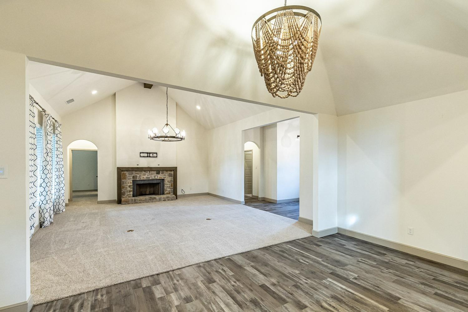 3633 133rd Street Lubbock, TX 79423 - Photo 10 of 46 a view of a livingroom with a fireplace