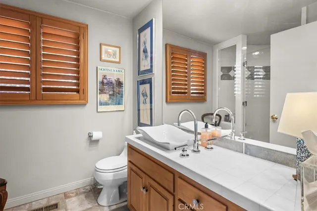 a bathroom with a sink and a toilet