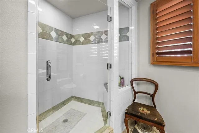 a bathroom with a sink and a shower