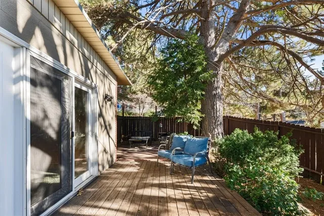 a view of balcony with furniture