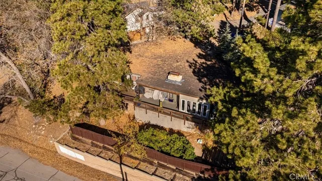 a view of a street with a tree