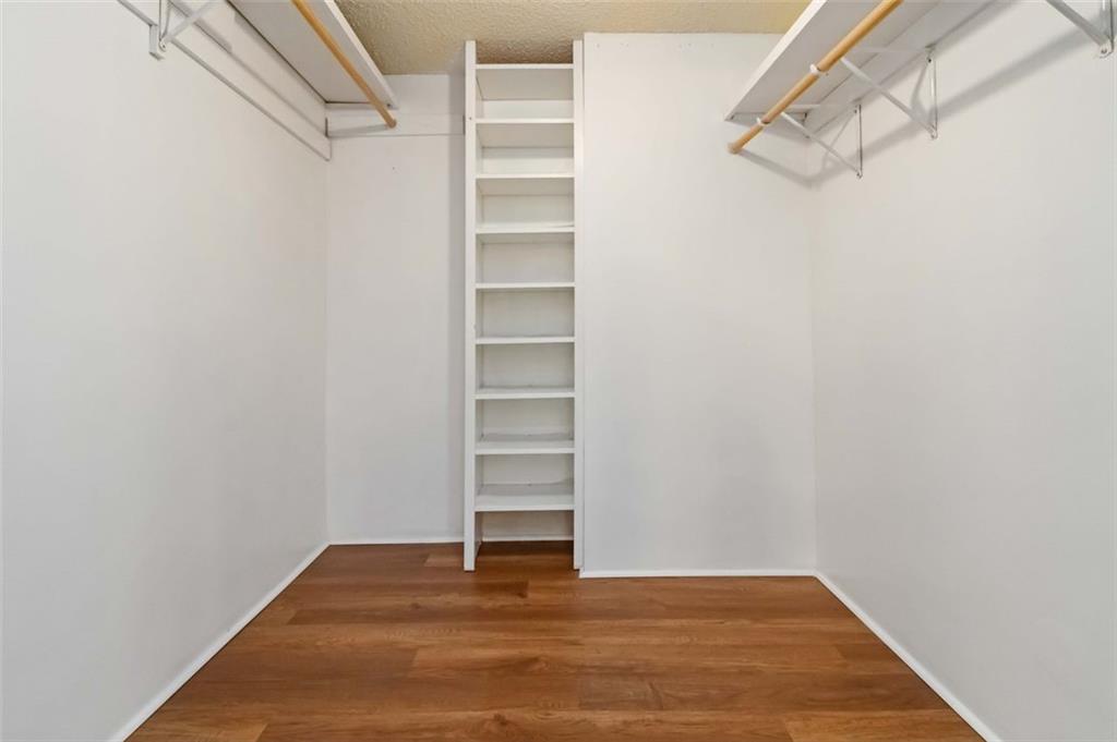 3530 Piedmont Road Northeast, Unit 5A Atlanta, GA 30305 - Photo 30 of 47 a view of a room with stairs and a closet