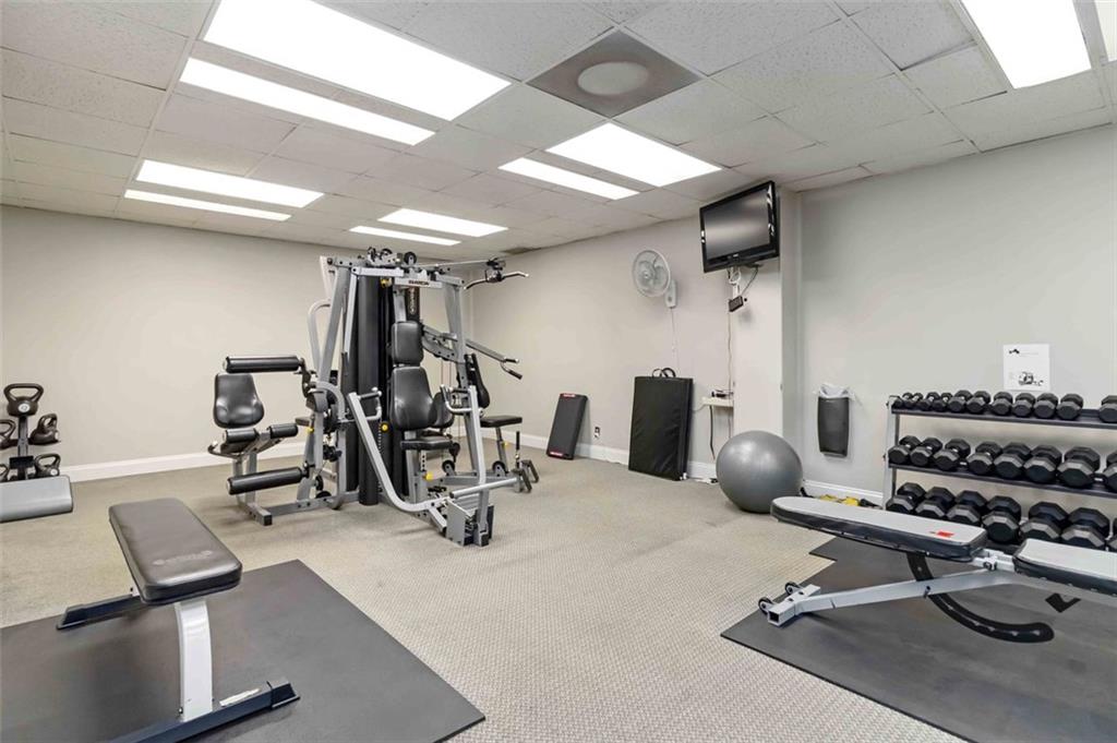 3530 Piedmont Road Northeast, Unit 5A Atlanta, GA 30305 - Photo 34 of 47 a view of a room with gym equipment