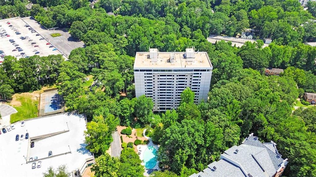 3530 Piedmont Road Northeast, Unit 5A Atlanta, GA 30305 - Photo 42 of 47 an aerial view of a house with a yard