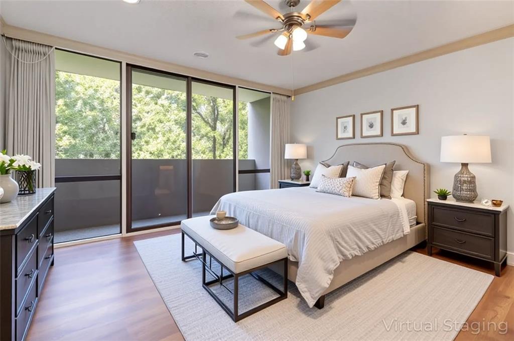 3530 Piedmont Road Northeast, Unit 5A Atlanta, GA 30305 - Photo 47 of 47 a bedroom with a bed and a chandelier