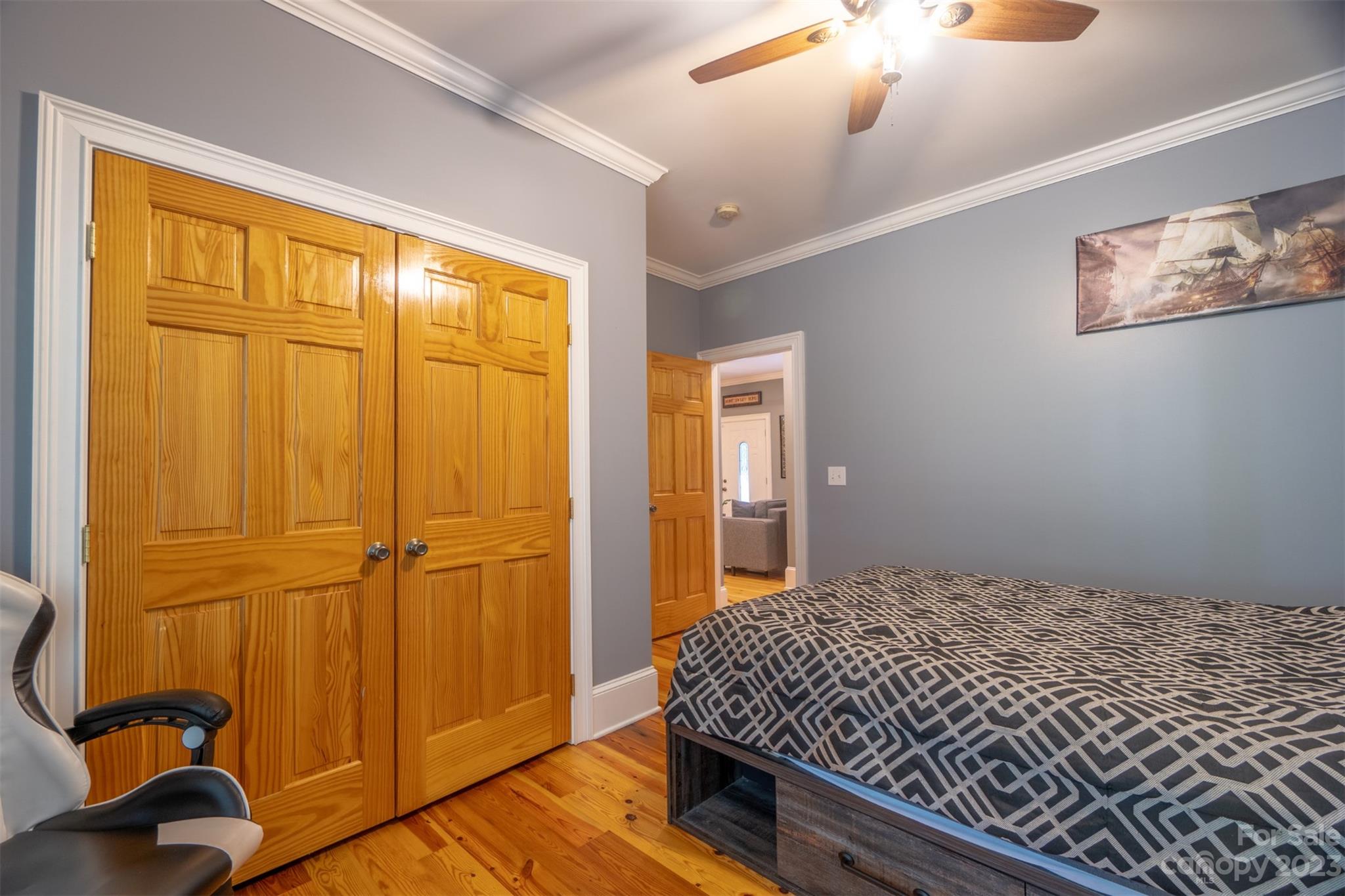 240 River Country Road Salisbury, NC 28146 - Photo 12 of 48 a bedroom with a bed and a dresser