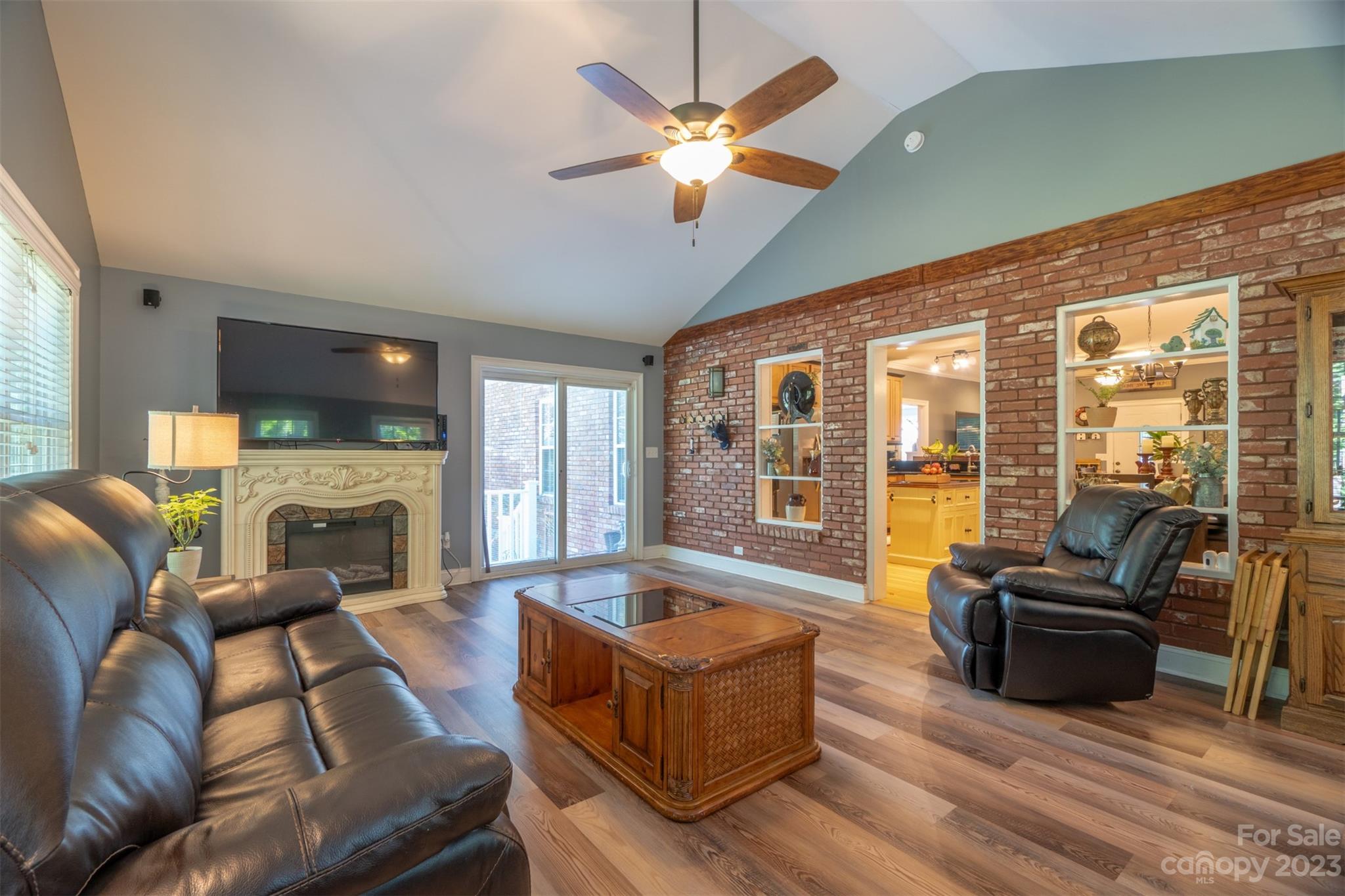 240 River Country Road Salisbury, NC 28146 - Photo 16 of 48 a living room with furniture fireplace and flat screen tv