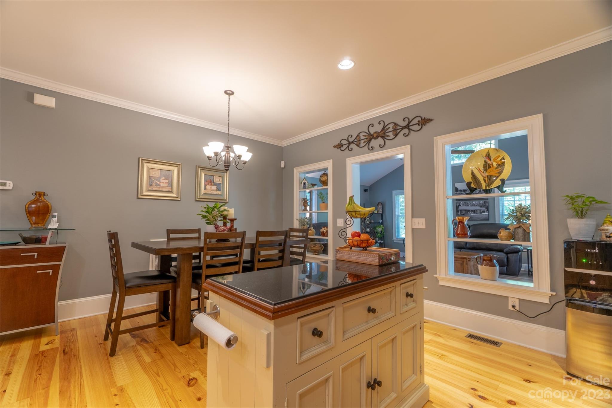 240 River Country Road Salisbury, NC 28146 - Photo 21 of 48 a kitchen with a sink cabinets and dining table
