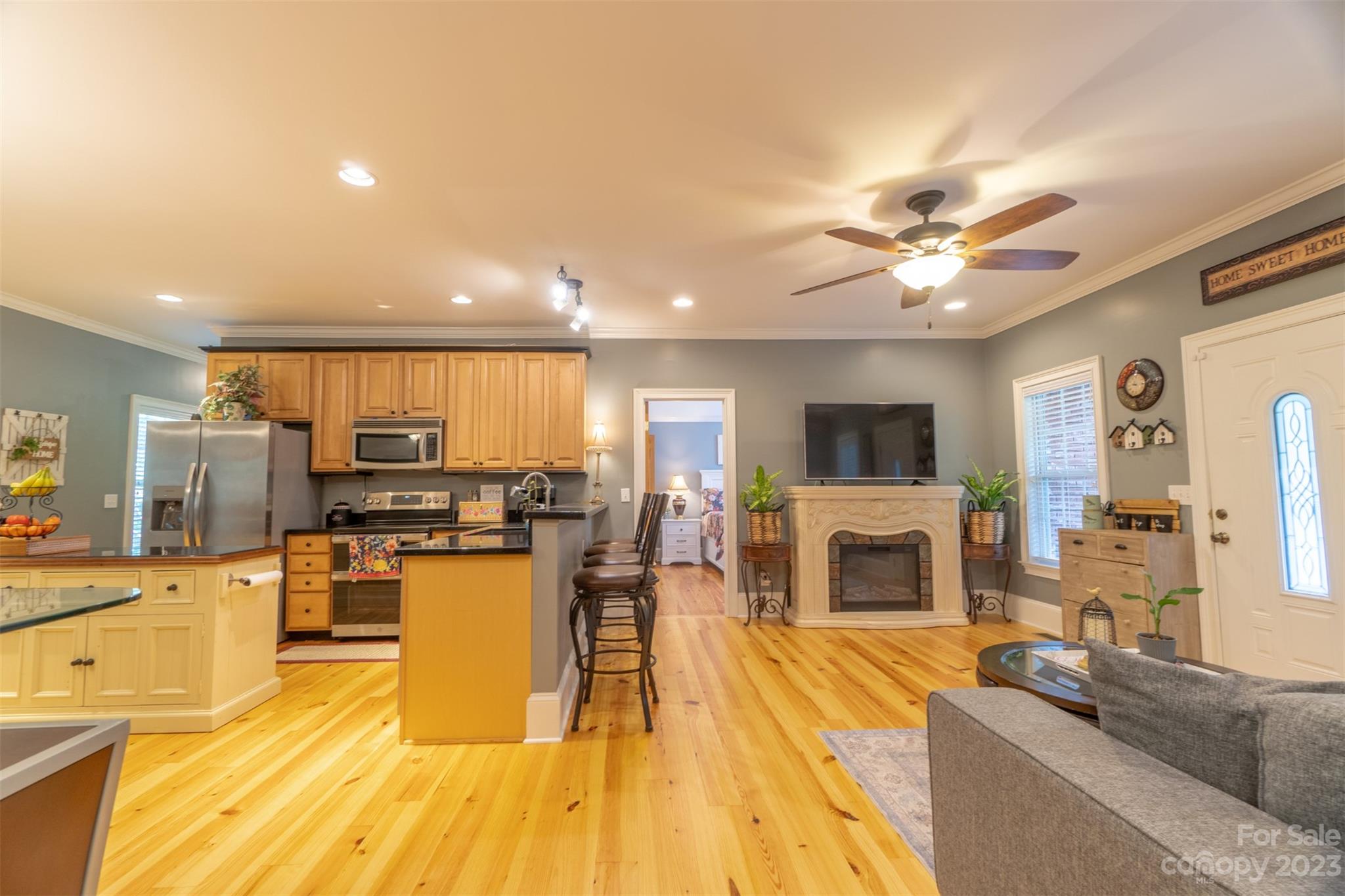 240 River Country Road Salisbury, NC 28146 - Photo 26 of 48 a living room with furniture and a flat screen tv