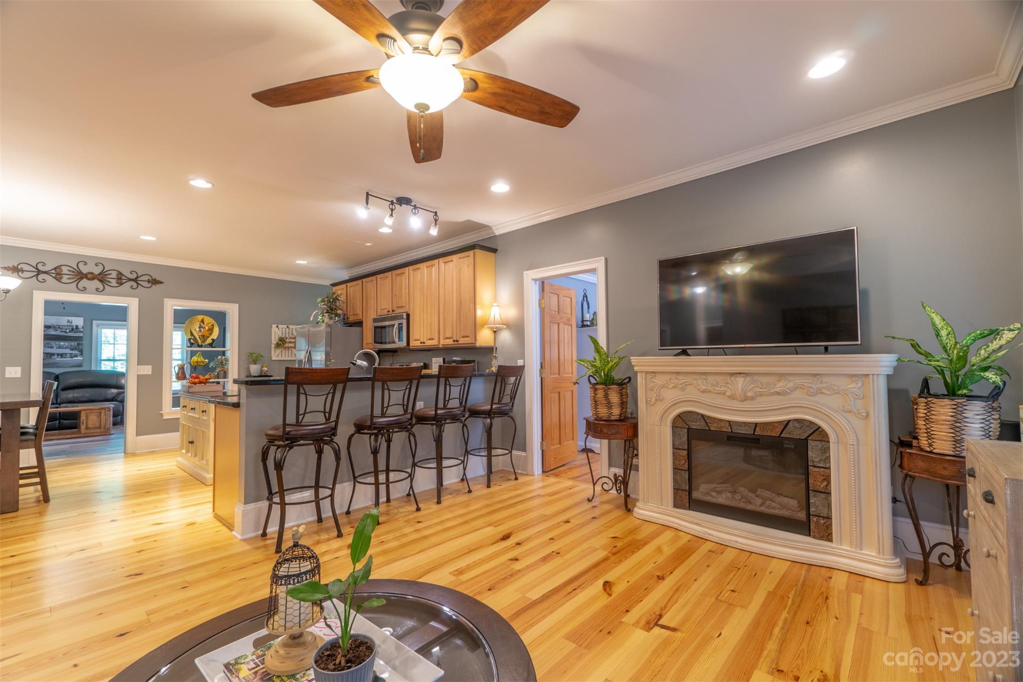 240 River Country Road Salisbury, NC 28146 - Photo 28 of 48 a living room with furniture fireplace and flat screen tv