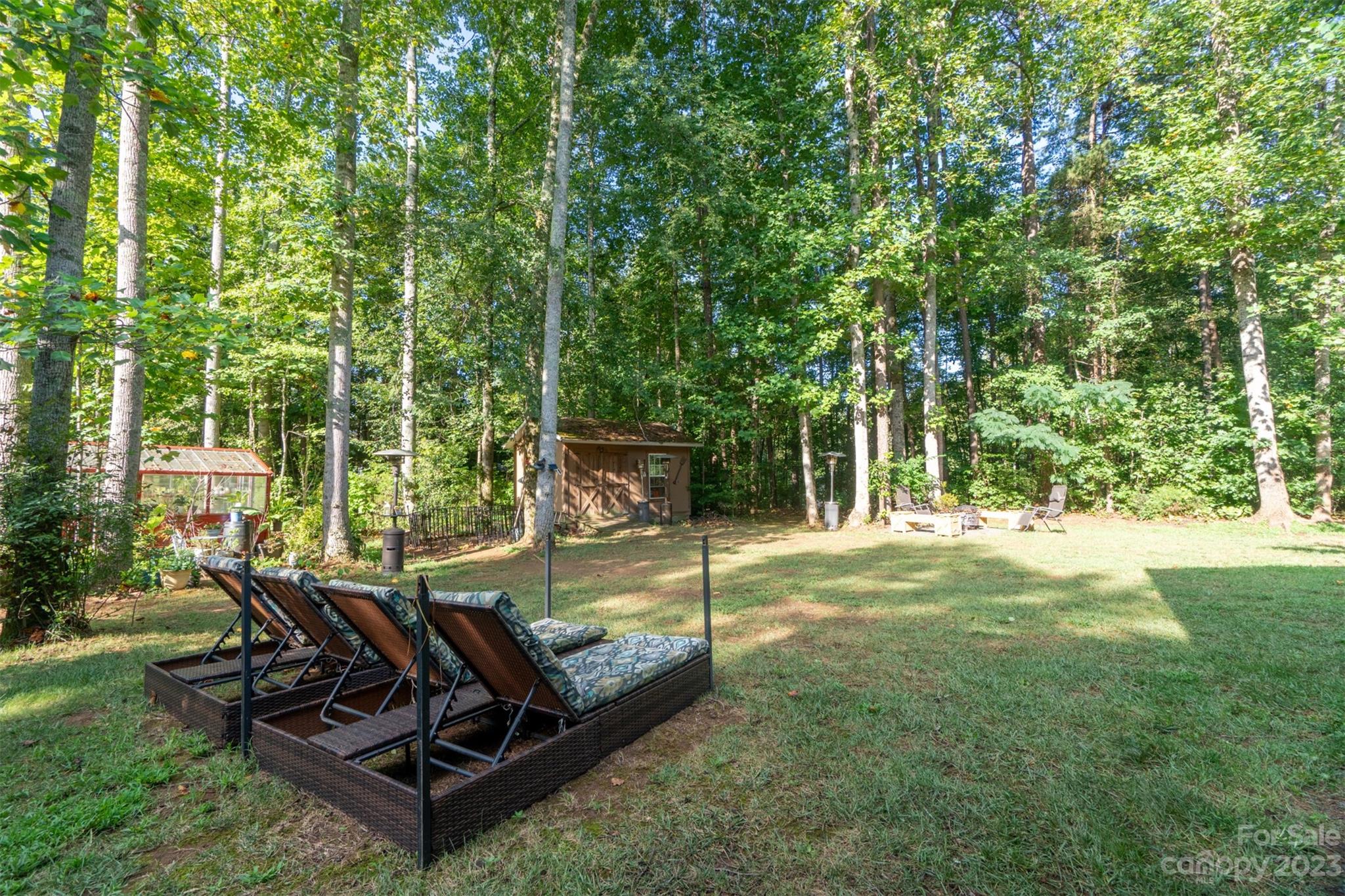 240 River Country Road Salisbury, NC 28146 - Photo 39 of 48 a view of a backyard with sitting area