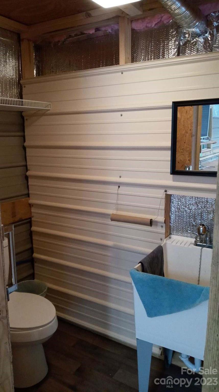 240 River Country Road Salisbury, NC 28146 - Photo 43 of 48 a bathroom with a sink and a toilet