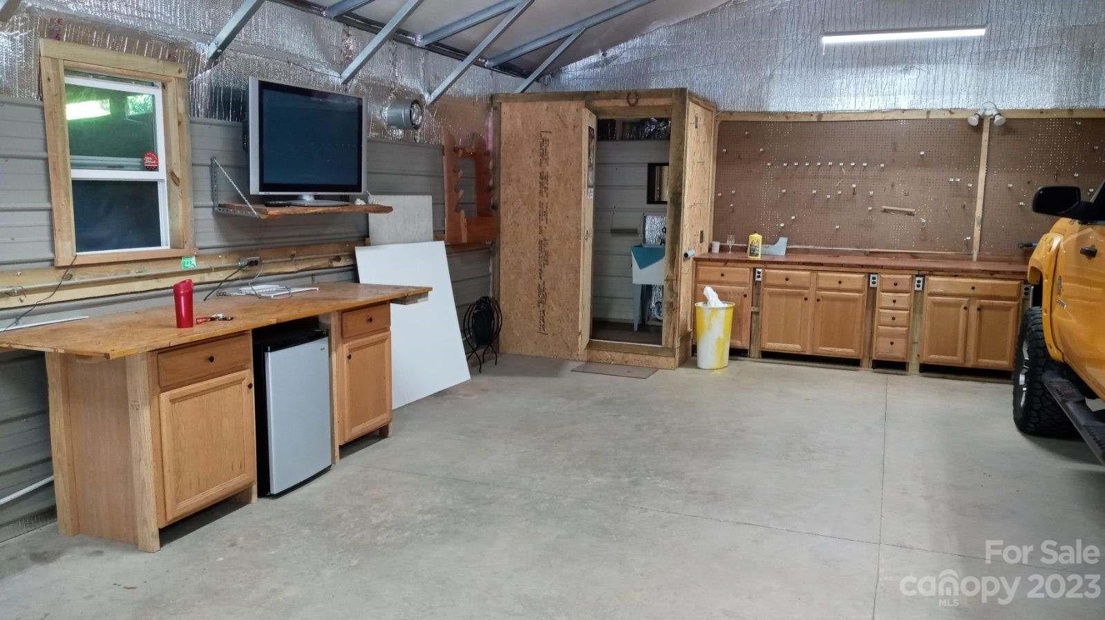 240 River Country Road Salisbury, NC 28146 - Photo 44 of 48 a kitchen with a stove and a refrigerator