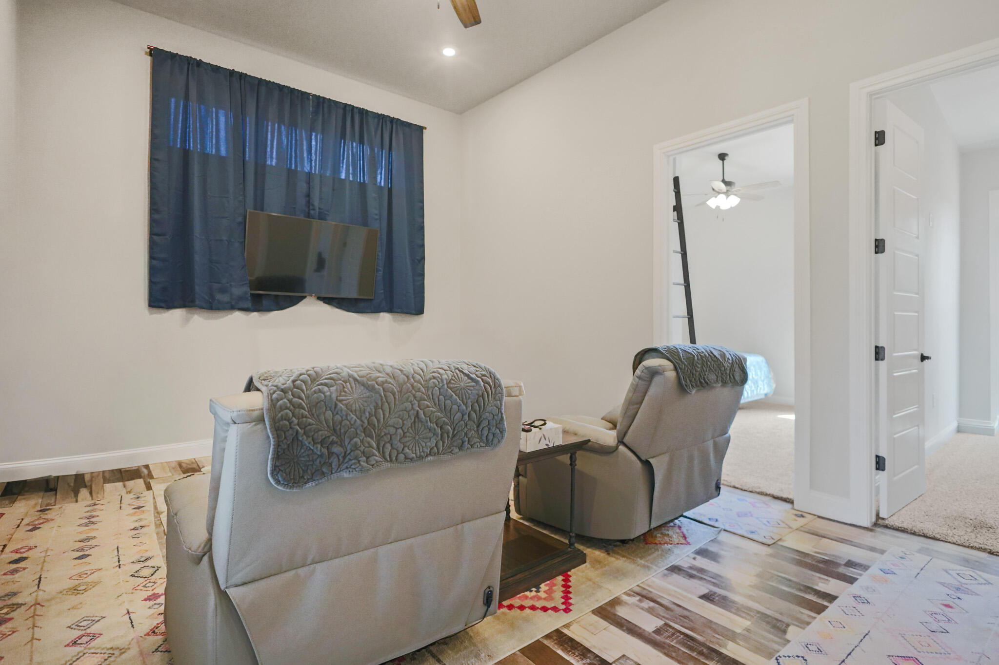 301 Fagan Road Snyder, TX 79549 - Photo 50 of 102 a living room with furniture a flat screen tv and a window