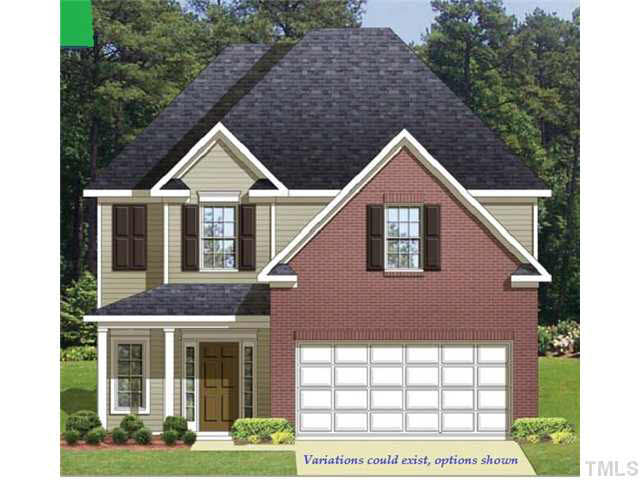 2908 Smooth Stone Trail Raleigh, NC 27610 - Photo 1 of 7 a front view of a house with garden
