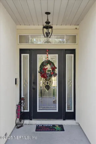 a view of entryway with wooden floor
