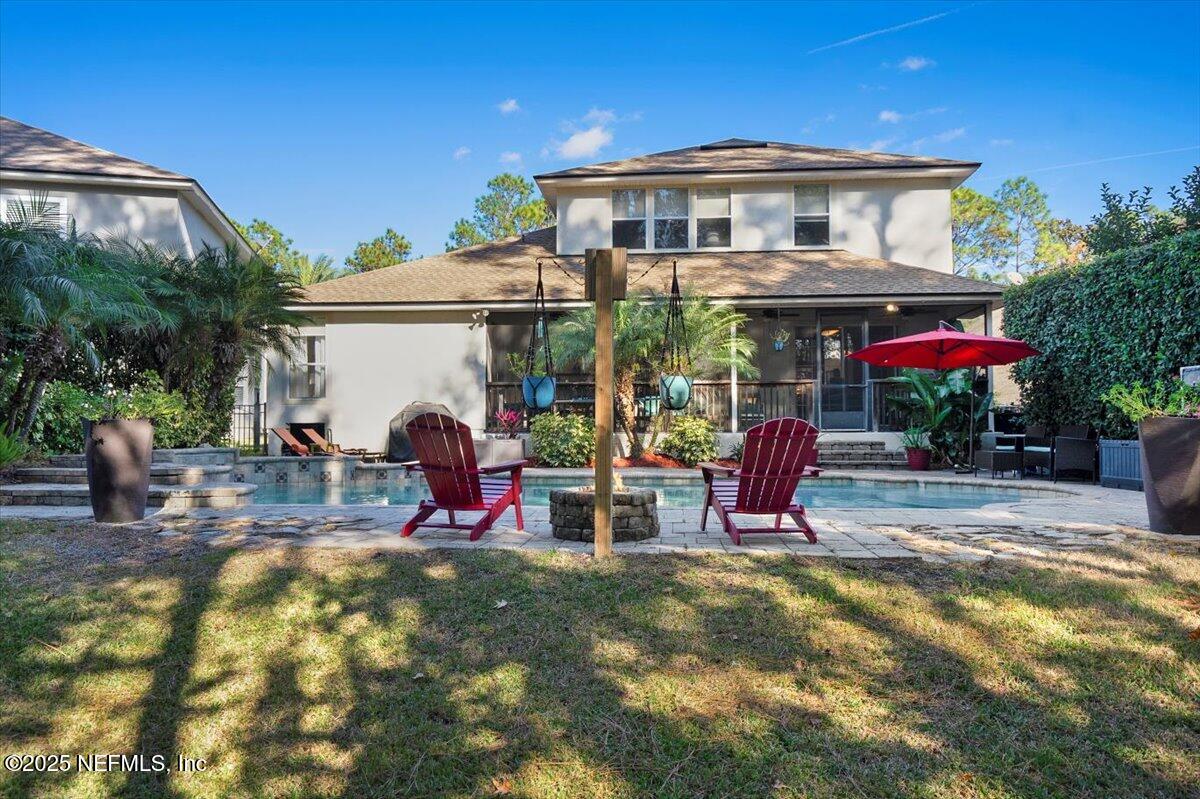 2493 Tall Cedars Road Fleming Island, FL 32003 - Photo 37 of 68 a view of a cafe with sitting area and garden