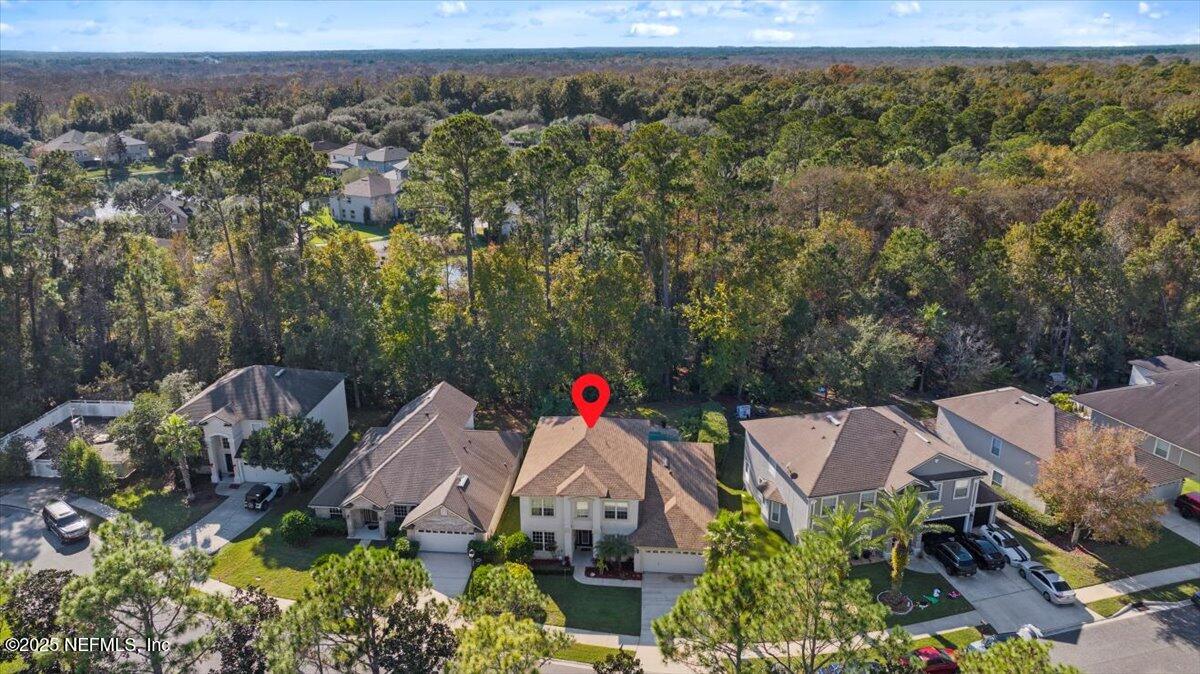 2493 Tall Cedars Road Fleming Island, FL 32003 - Photo 43 of 68 an aerial view of a house with a yard