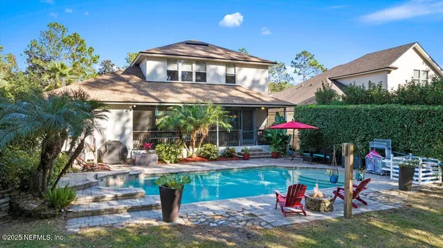 a view of a big room with large trees