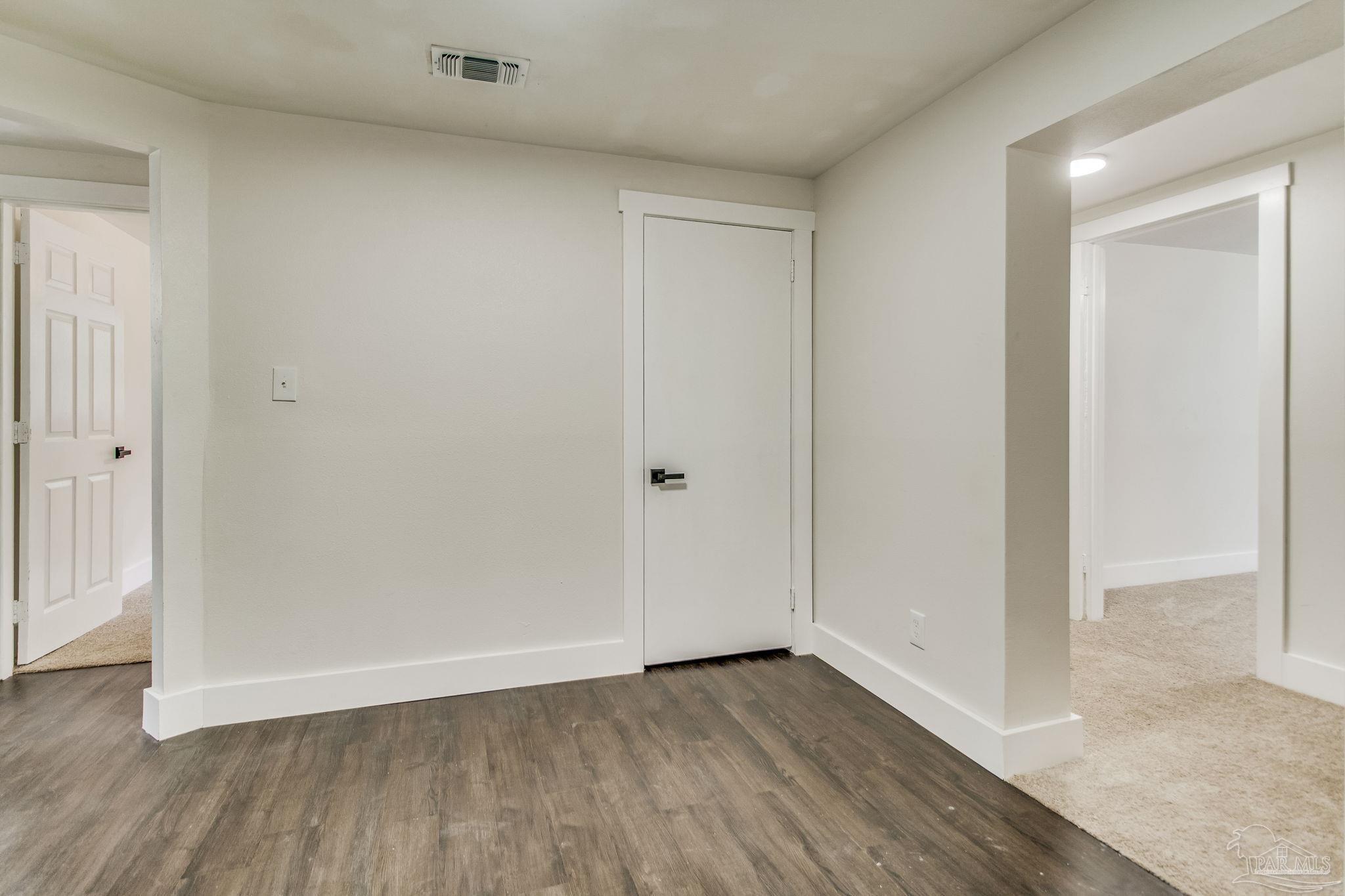 4355 Highway 95A North Molino, FL 32577 - Photo 24 of 54 a view of an empty room with wooden floor