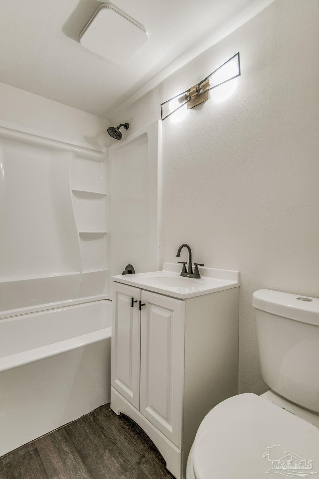 4355 Highway 95A North Molino, FL 32577 - Photo 31 of 54 a bathroom with a sink a toilet and shower