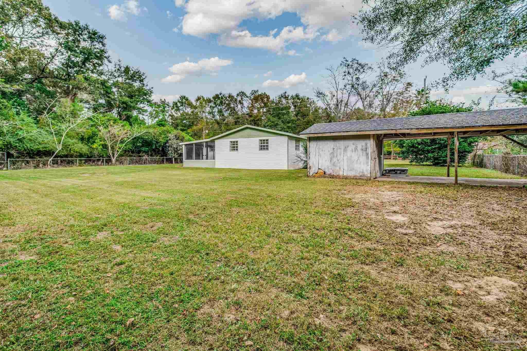 4355 Highway 95A North Molino, FL 32577 - Photo 49 of 54 a house view with a garden space