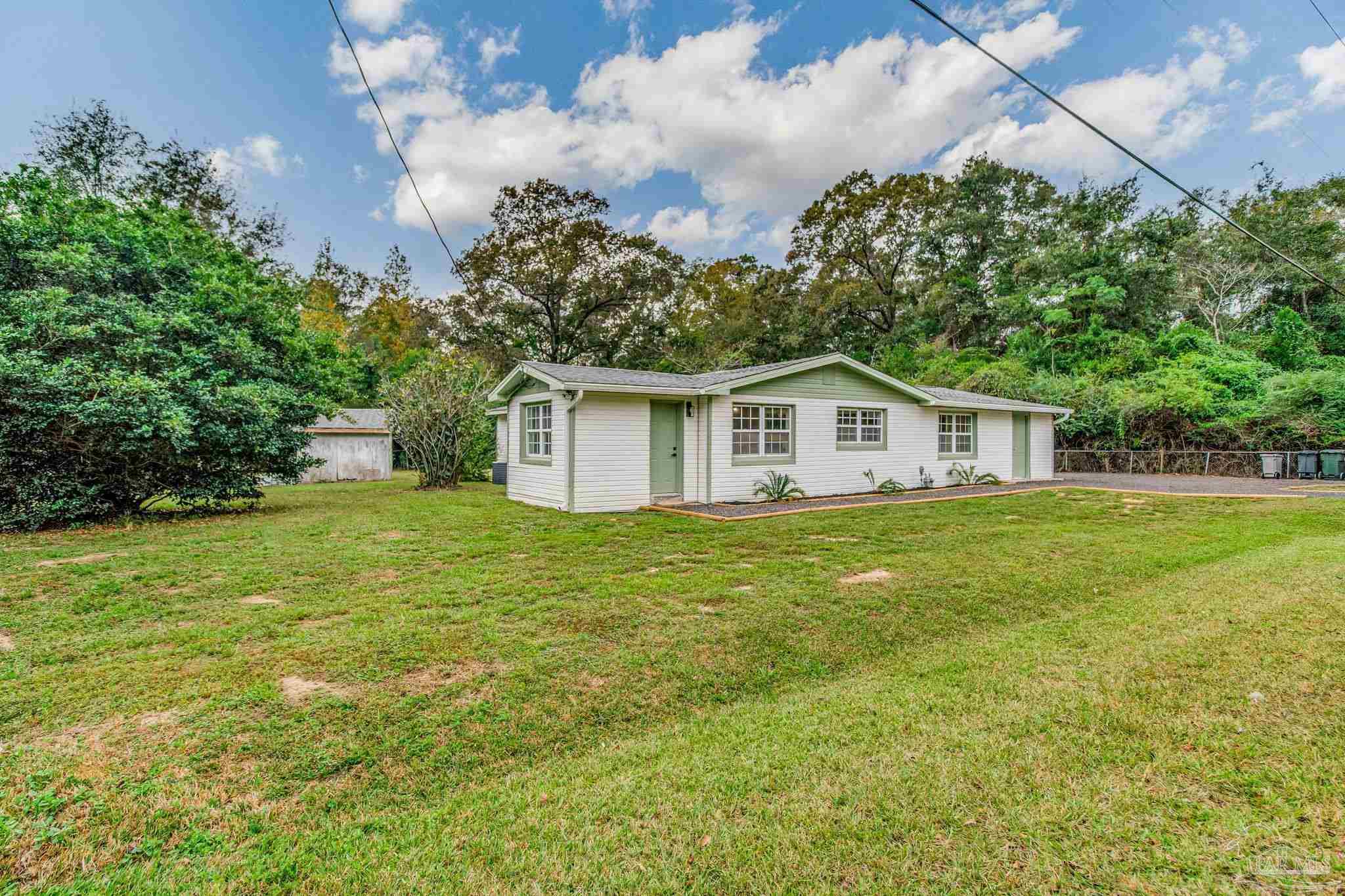 4355 Highway 95A North Molino, FL 32577 - Photo 53 of 54 a house view with a garden space