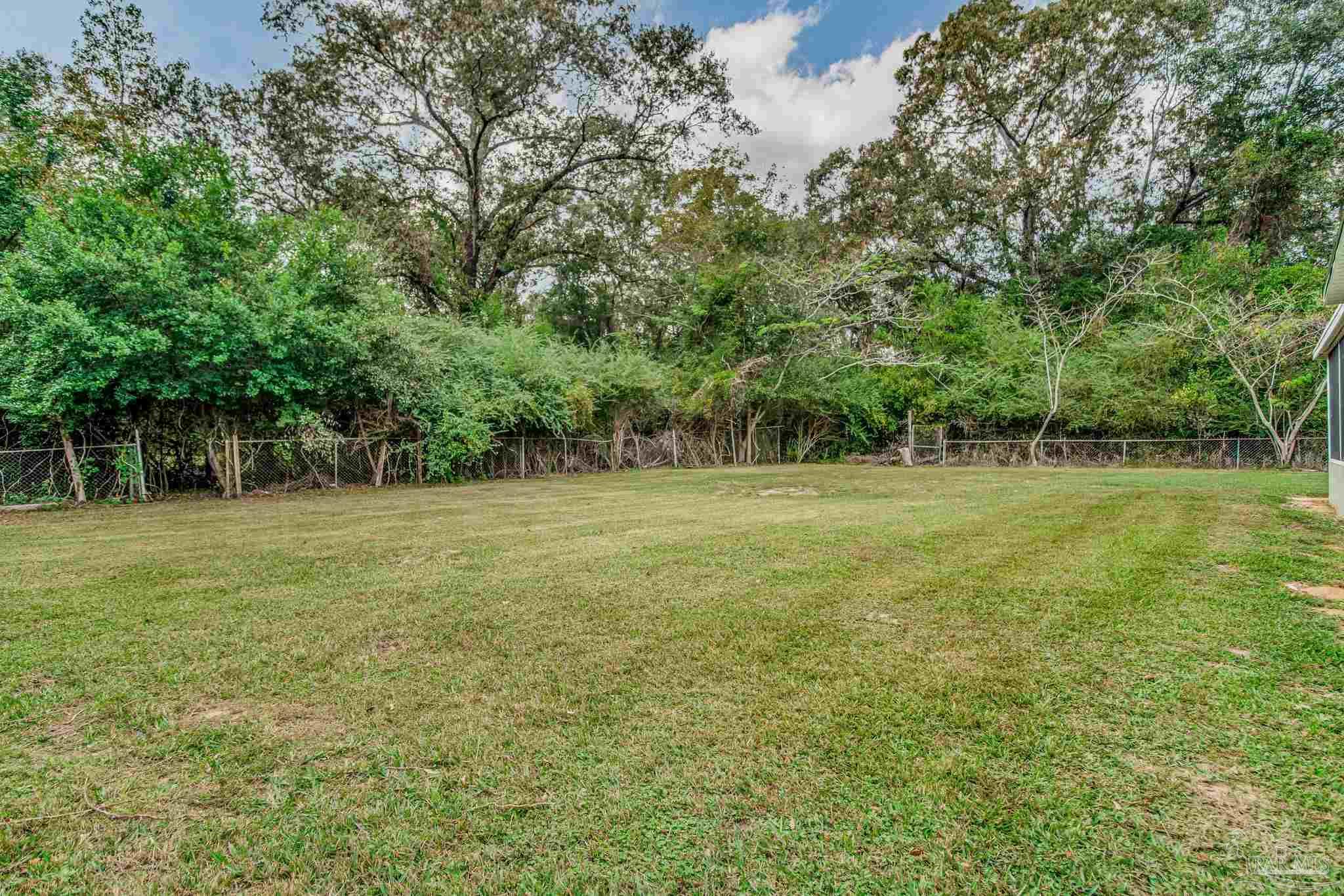 4355 Highway 95A North Molino, FL 32577 - Photo 6 of 54 a view of a green field