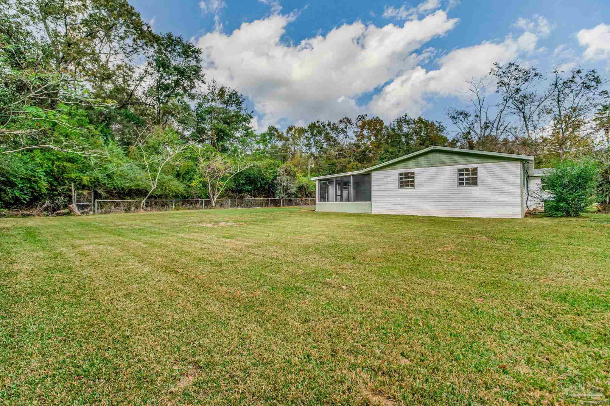 4355 Highway 95A North Molino, FL 32577 - Photo 7 of 54 a house view with a outdoor space
