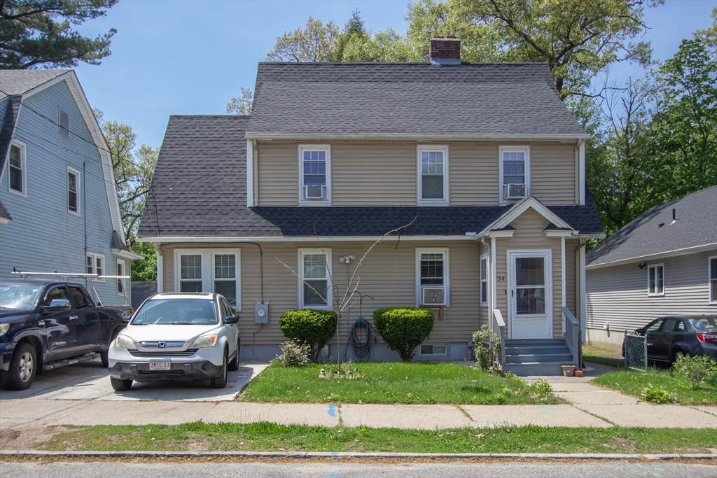 34 Preston Street Springfield, MA 01109 - Photo 2 of 34 a front view of a house with a yard