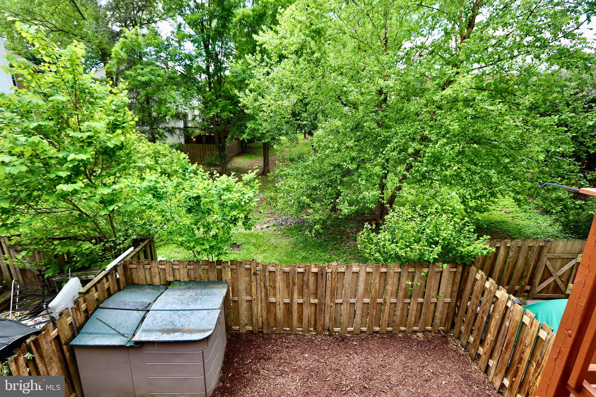 7442 Broken Staff Columbia, MD 21045 - Photo 22 of 28 a view of small yard from a balcony