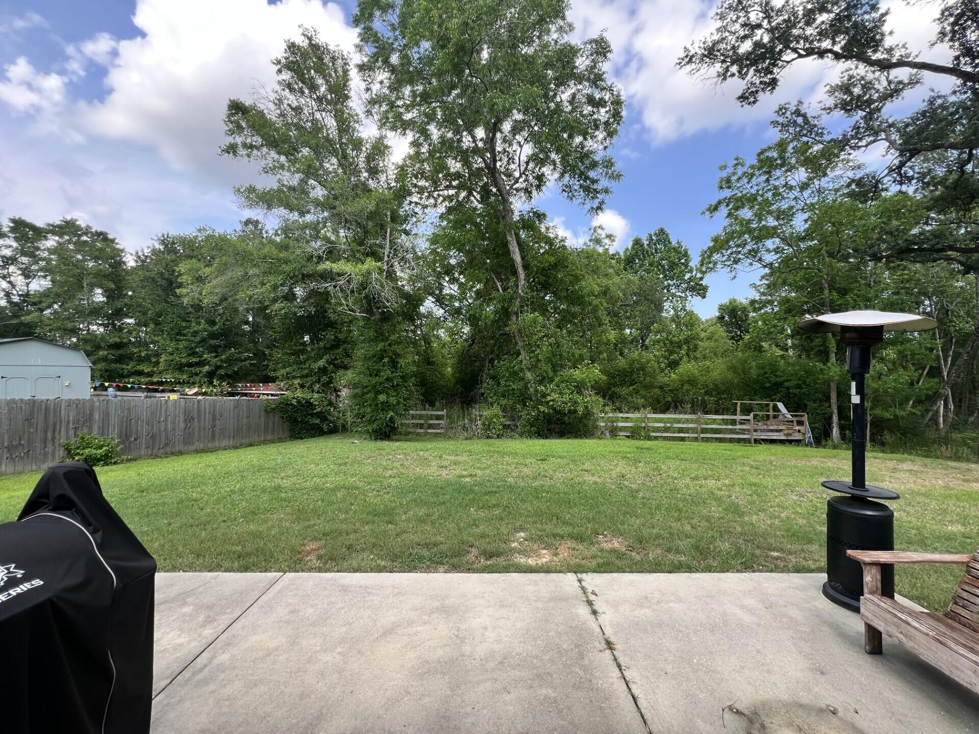 4948 Guernsey Road Pace, FL 32571 - Photo 24 of 25 a fire hydrant in the middle of a park