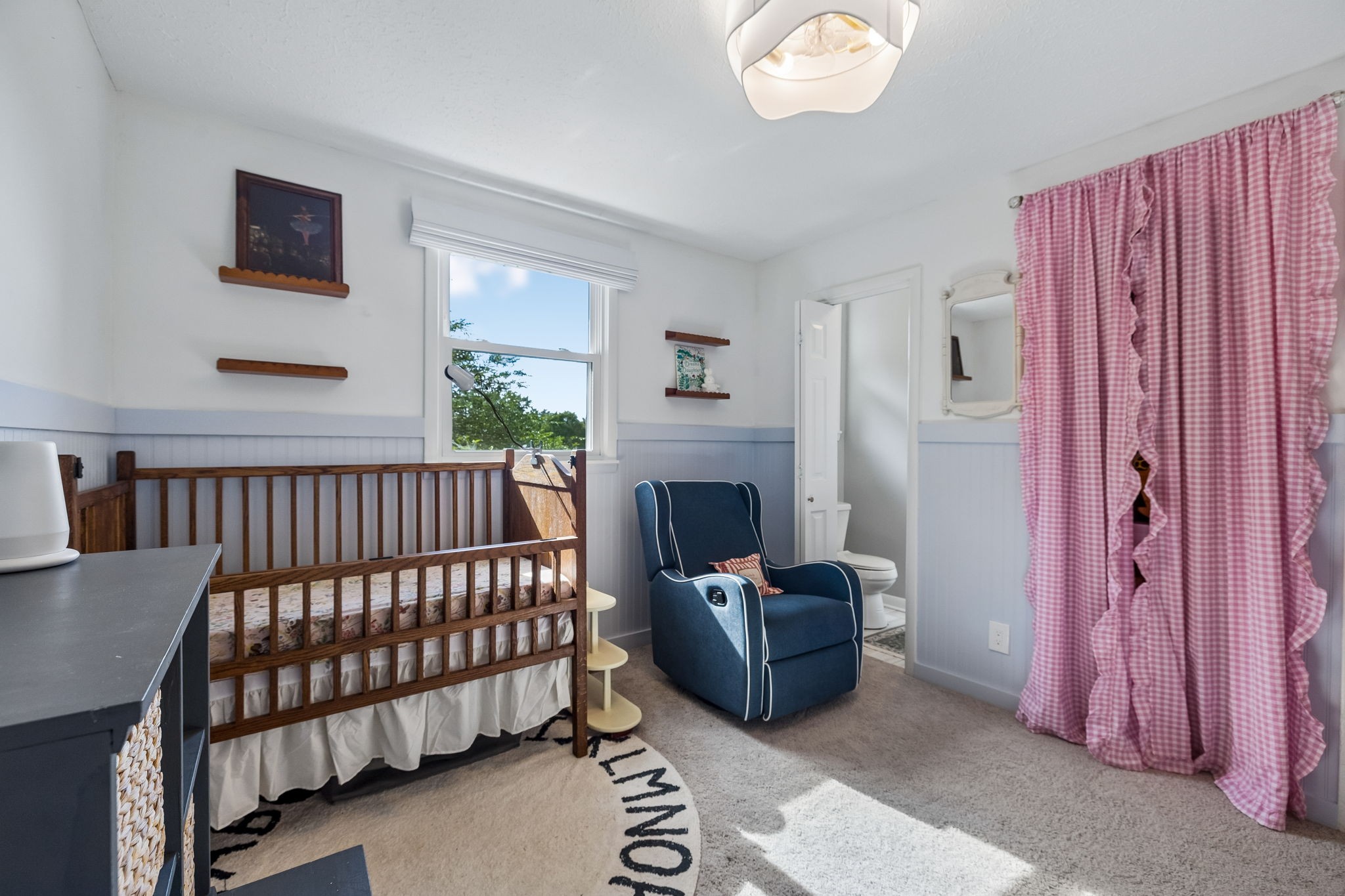 1326 Shahan Road Pleasant View, TN 37146 - Photo 20 of 41 a bedroom with furniture and a window