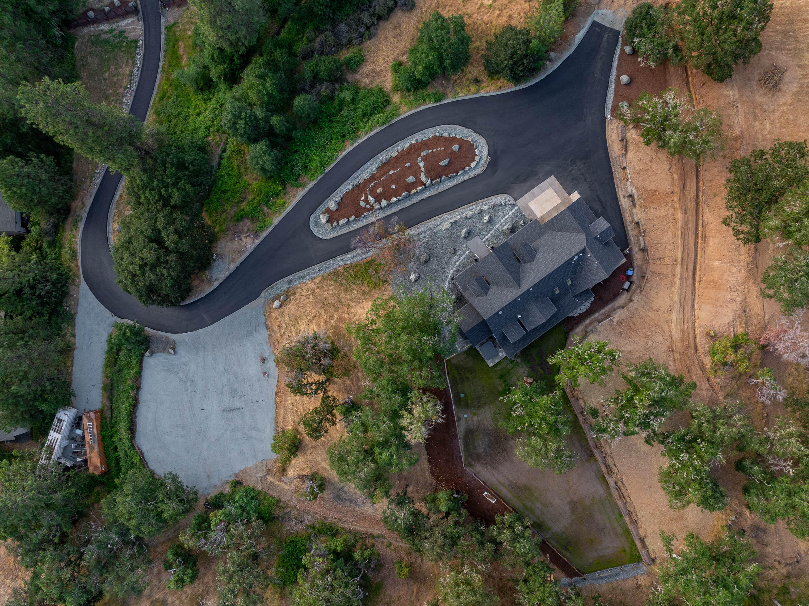 182 Wards Creek Road Rogue River, OR 97537 - Photo 74 of 80 an aerial view of a house with garden space and a street view