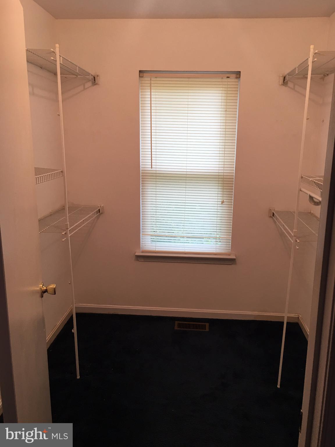 8679 Ridge Road Ellicott City, MD 21043 - Photo 13 of 21 Walk-in closet off master bedroom