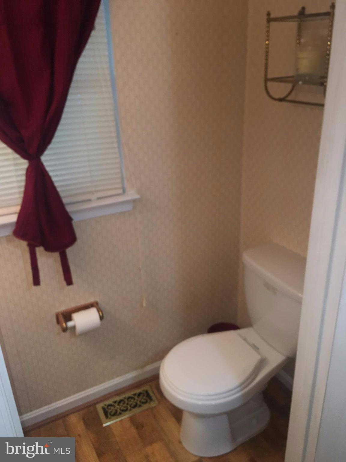 8679 Ridge Road Ellicott City, MD 21043 - Photo 10 of 21 Main floor half bath