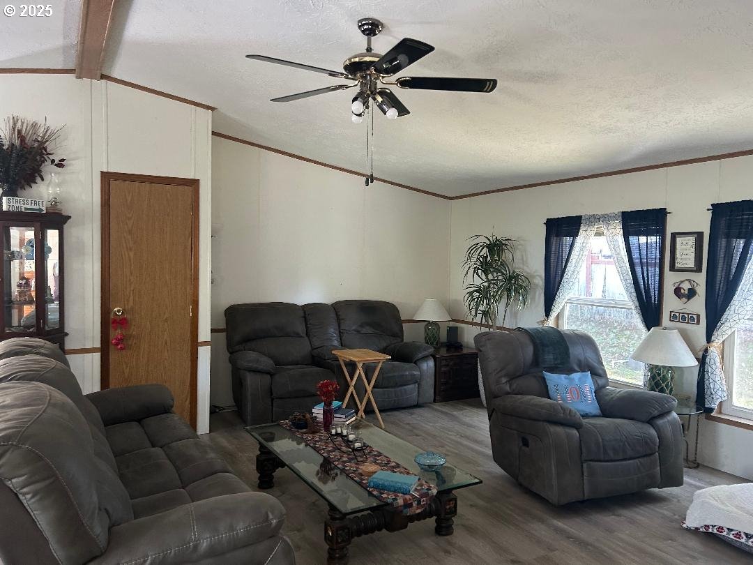 96465 Coverdell Road, Unit 20 Brookings, OR 97415 - Photo 11 of 21 a living room with furniture and a window